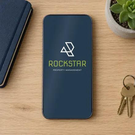 Rockstar Property Management logo on a phone screen (mockup), designed by Sharp Design